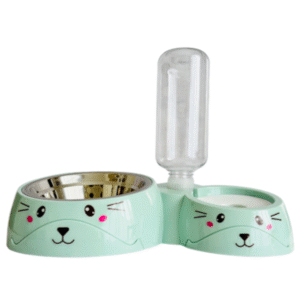 Plato doble con bebedero automático en forma de carita de gato. Ideal para servir alimento seco o húmedo y mantener agua fresca. Diseño antideslizante, duradero y fácil de limpiar.